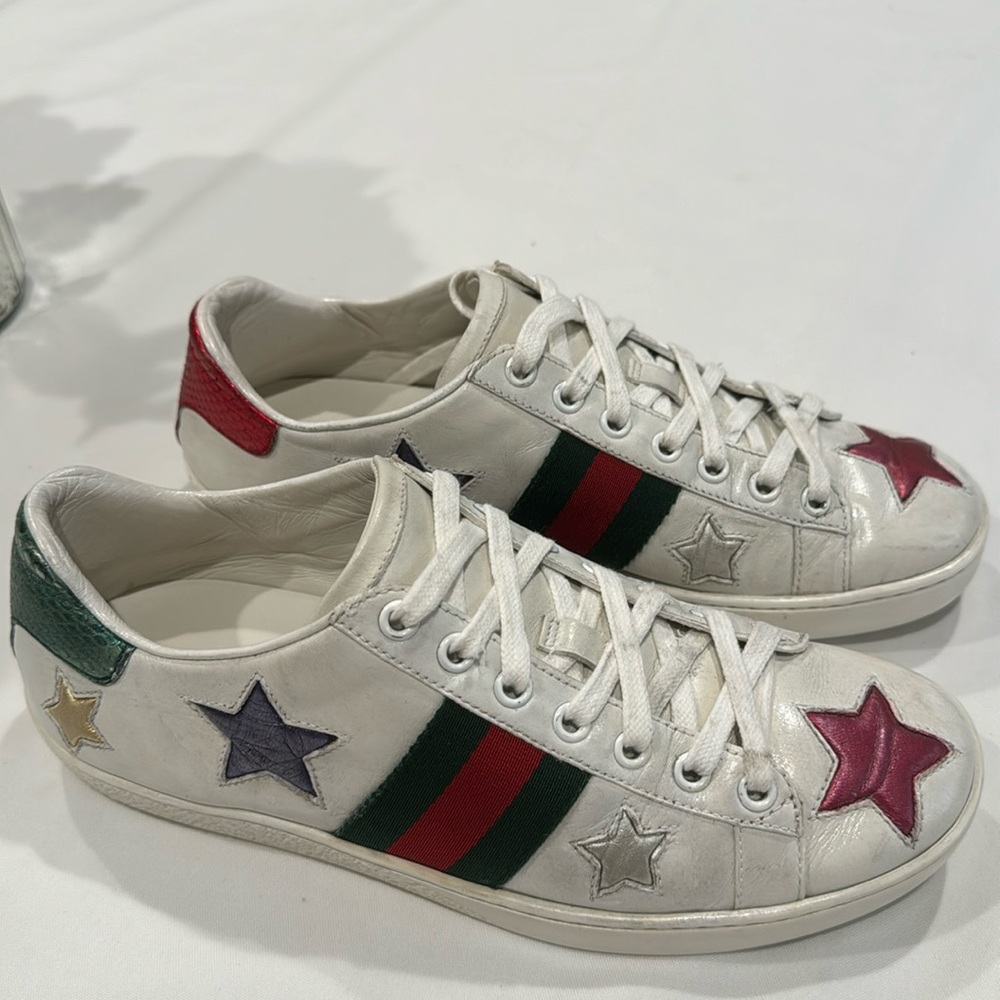 Authentic Gucci sneakers with stars design